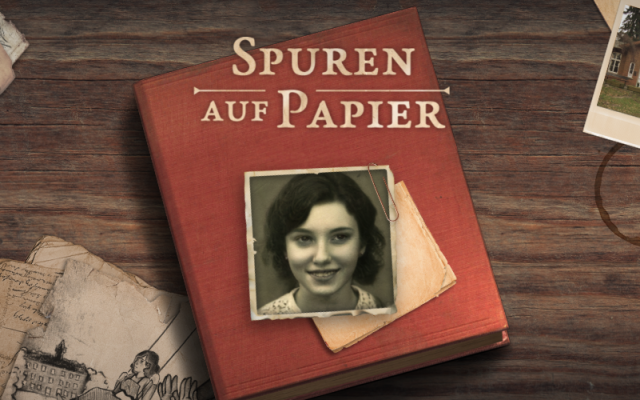 Tagebuch mit Foto einer jungen Frau und Schriftzug Spuren auf Papier