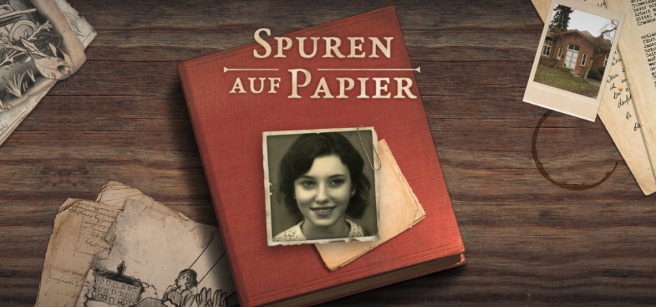 Tagebuch mit dem Foto einer jungen Frau und dem Schriftzug Spuren auf Papier